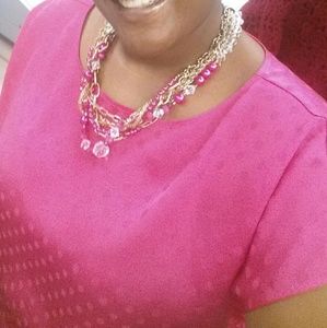 Pink short sleeve blouse with polka dots